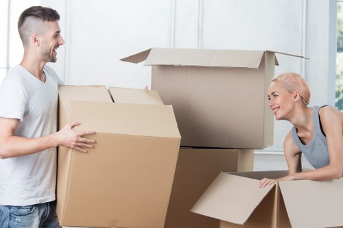 Professional movers loading a removal truck