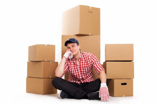 Removals team assisting with unpacking at a new home